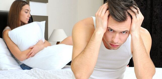 Men and women in bed